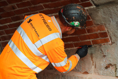 Removal and replacing of brickwork repairs to hide the masonry reinforcement inside the. bridge