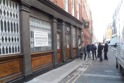 Assessing the pavement for the cellar and basement vault repair at Great Chapel Street, London